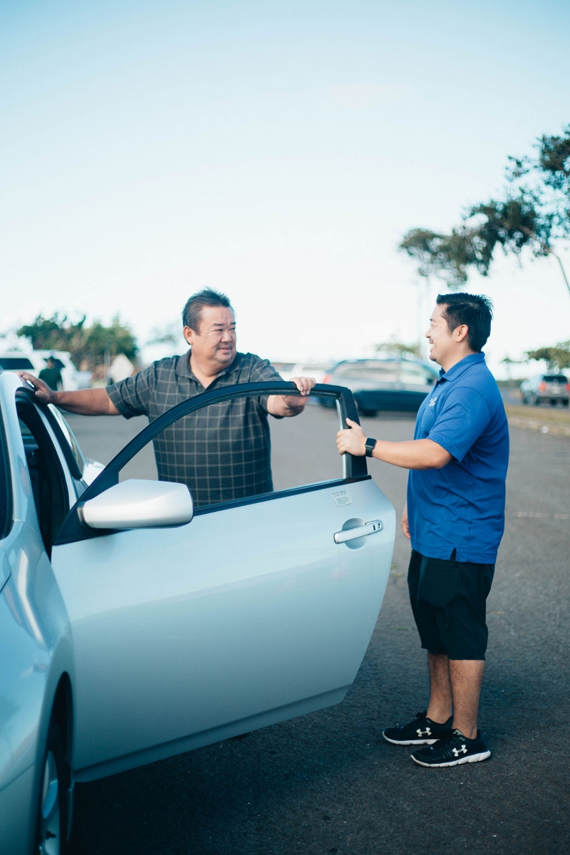 Person opening the car for the patient